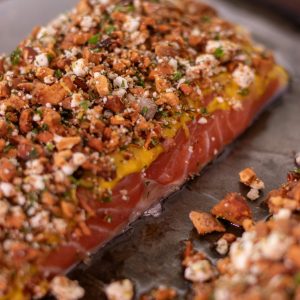 Delicious baked salmon with a crunchy herb crust, perfect for gourmet meals and healthy dining.